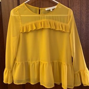 Cupcakes & Cashmere yellow ruffle top.